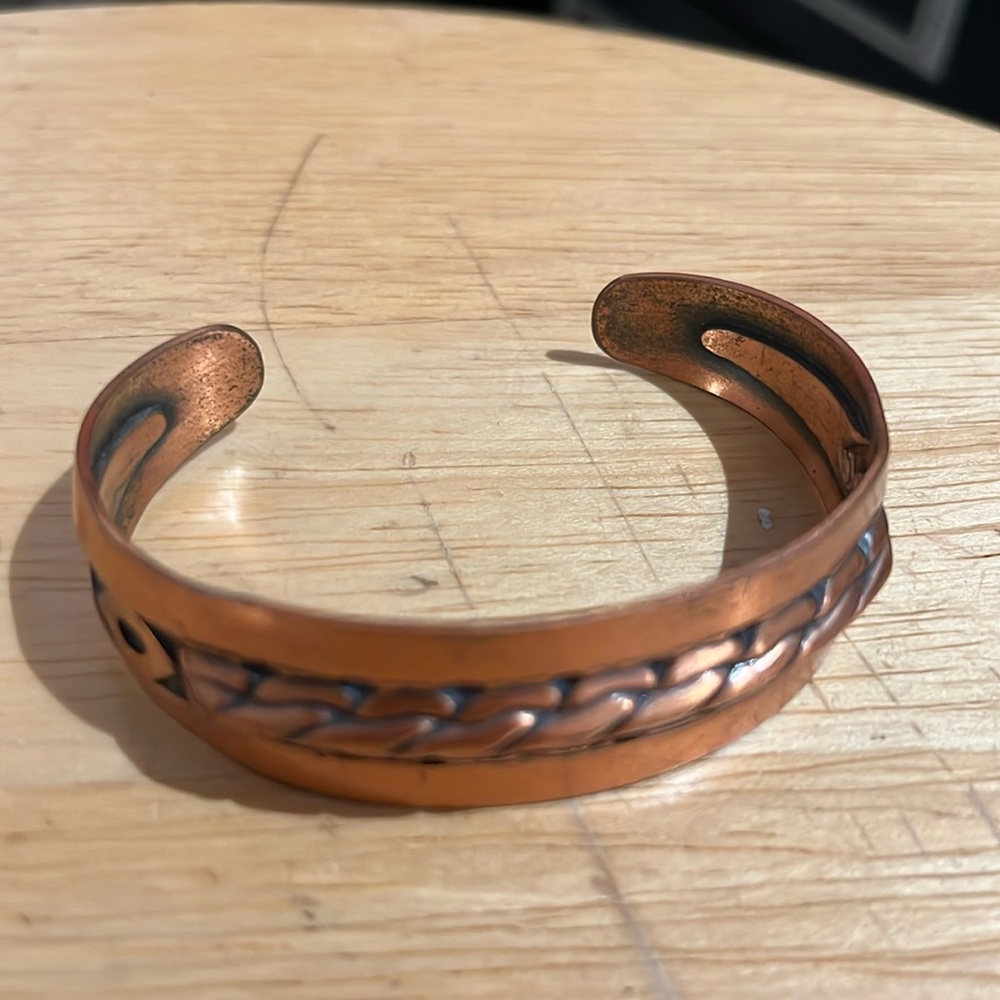 COPPER BELL MARKED COPPER BRACELET , braided tribal design